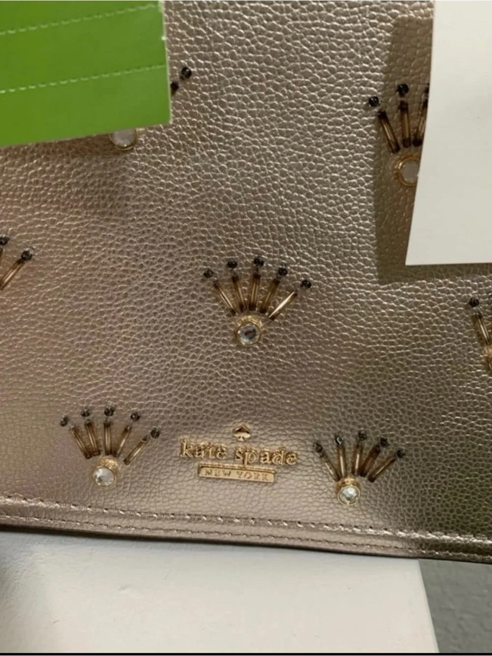 Kate Spade Metallic Champagne Maisie Patterson crossbody purse $359